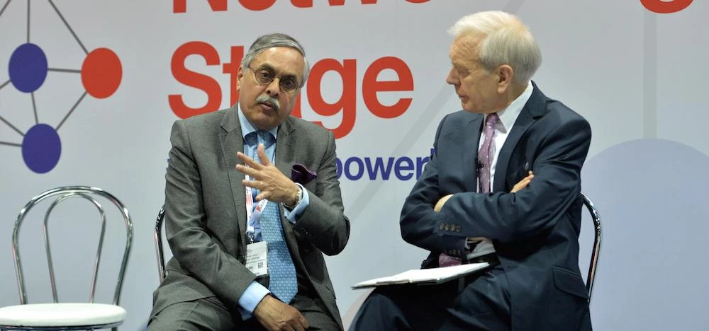 Dr Singh (left) with broadcaster John Humphrys