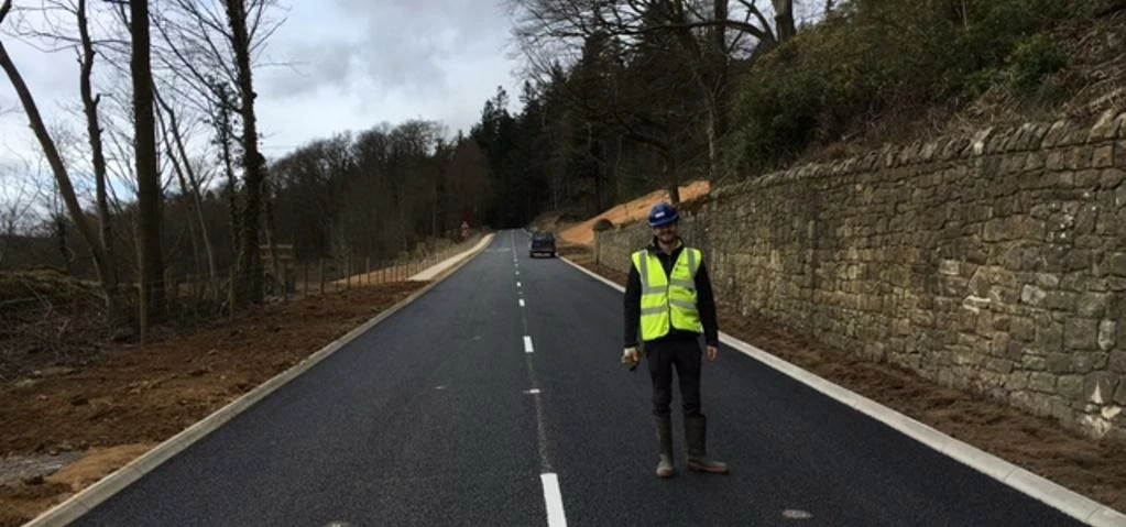 B6344 at Cragend March 2016 – Scott Mackenzie, EcoNorth Ltd Ecologist stands on the restored road