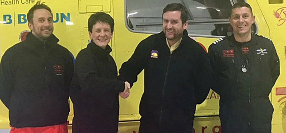 Yorkshire Air Ambulance paramedics Adrian Fell and Sammy Wills and pilot Garry Brasher (right) meet 