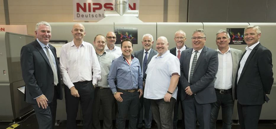 key individuals from both Adare and Richo at Drupa 2016 – where the deal was signed.