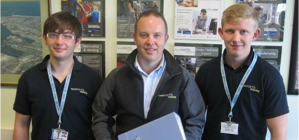 Apprentices Jordan McMullen and Kyle Hackett with TNT Senior Training Officer Davey Collins