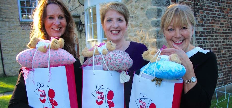 Sue McCoy, Judith Wright and Eileen Richardson of Hug in a Bag