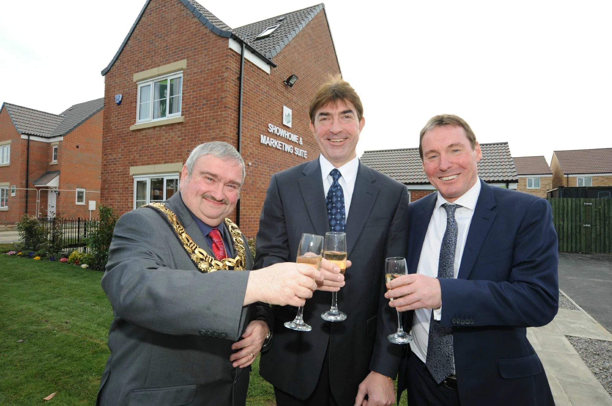 The Mayor of Barnsley Councillor Ken Richardson, Persimmon Homes sales director Simon Whalley and ma