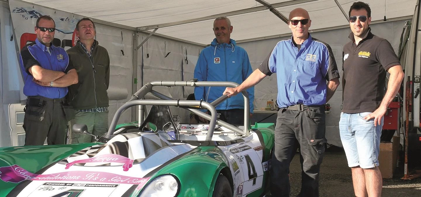 : Kieran Brophy, partner at R P Smith & Co (second from the left) with the car team L-R owner Andy B