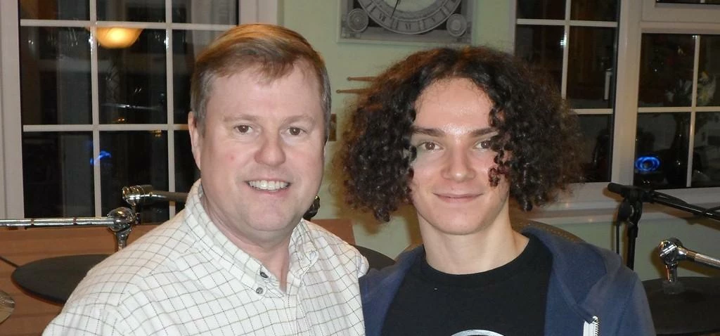 Beating off stiff competition: Ian Macpherson from Percussive Edge with George.