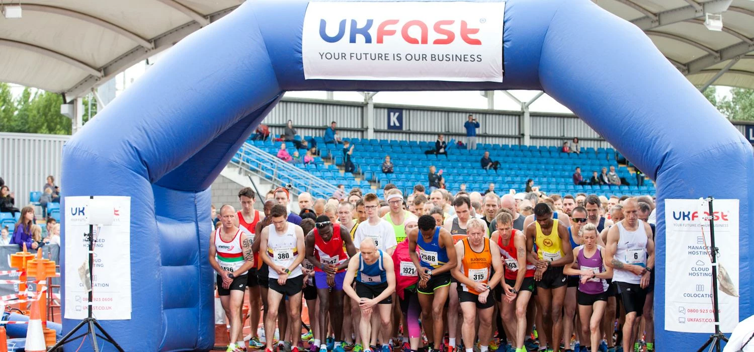 runners line up at the start of the UKFast We Love Manchester 10K