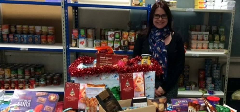 Awbery’s Financial Controller Louise Green delivering the firm’s Christmas Box to Derby’s The Hope C