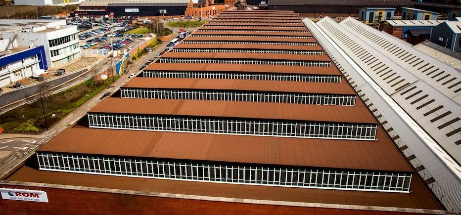 The new 20 metre-high re-roof of ROM Ltd’s Brightside Lane manufacturing facility.