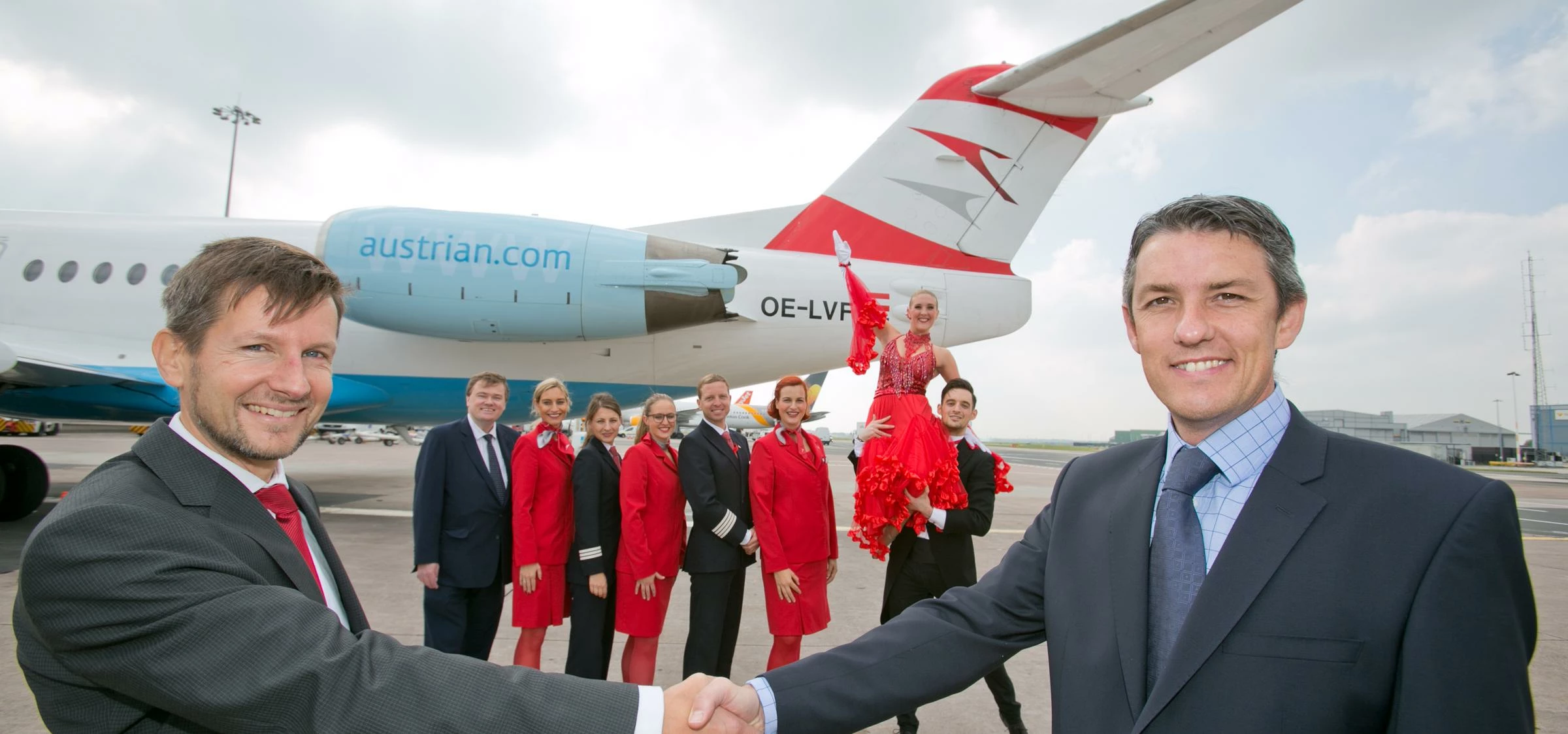 Christian Schindler (left), Lufthansa Group's UK regional director, shakes hands with Stephen Turner
