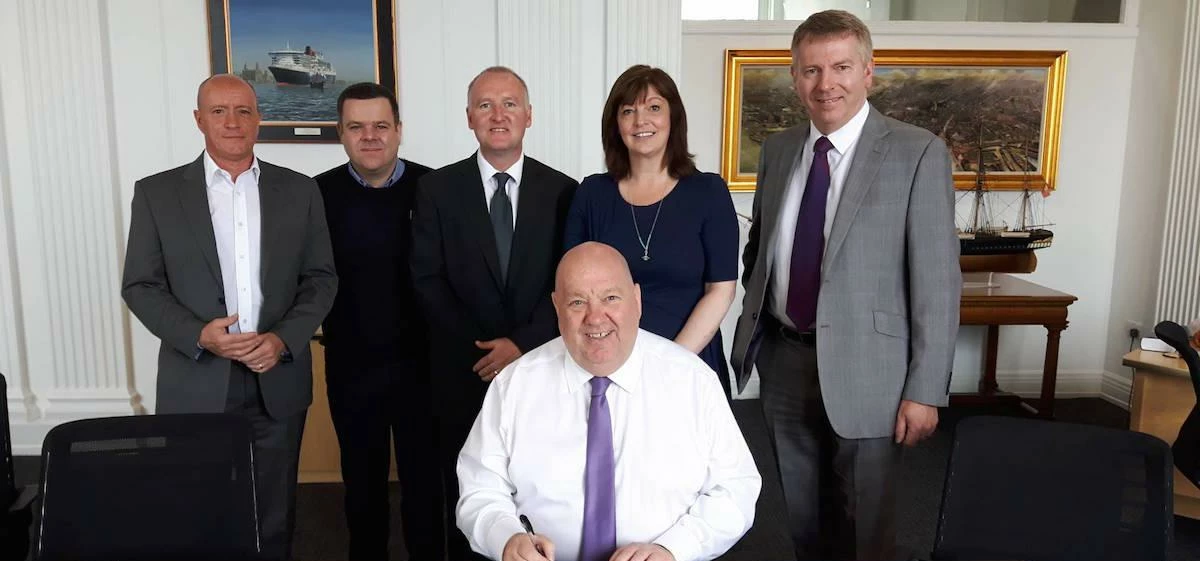 L-R: Mayor Joe Anderson (seated) with Ucatt’s Steve Craig and John Shepherd, Tony Costello from Sedd
