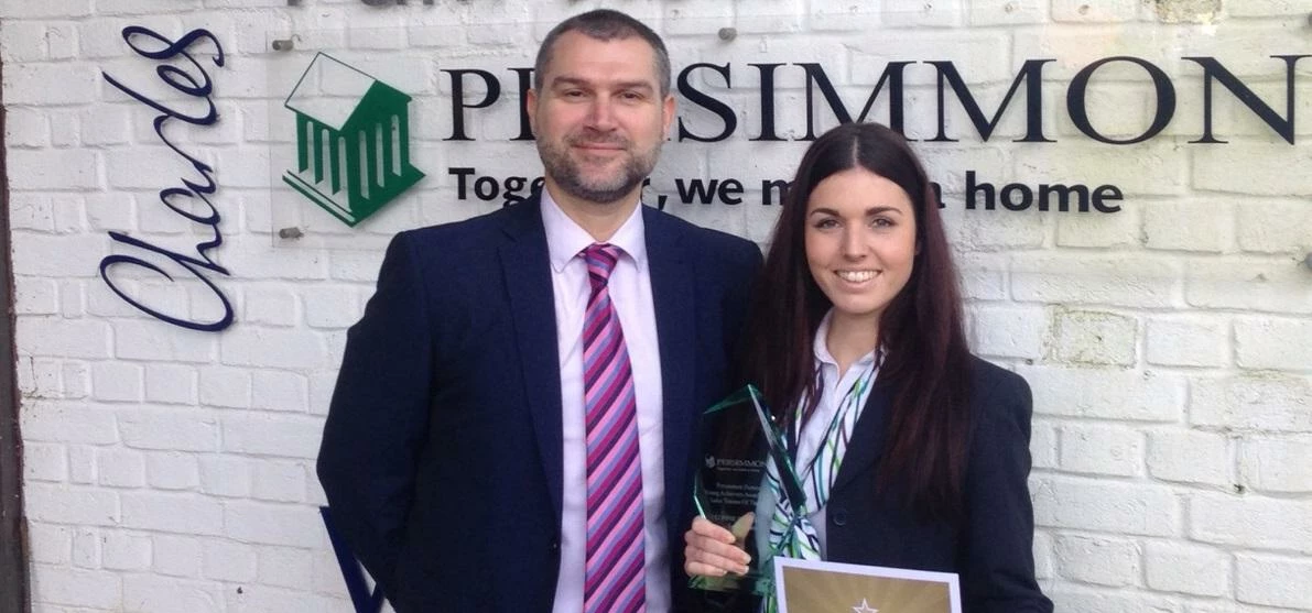 Persimmon Homes South Coast managing director Matt Paine with award-winning sales trainee Connie Doc