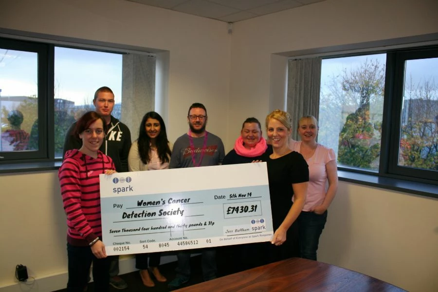 Jess Buffham hands over the cheque