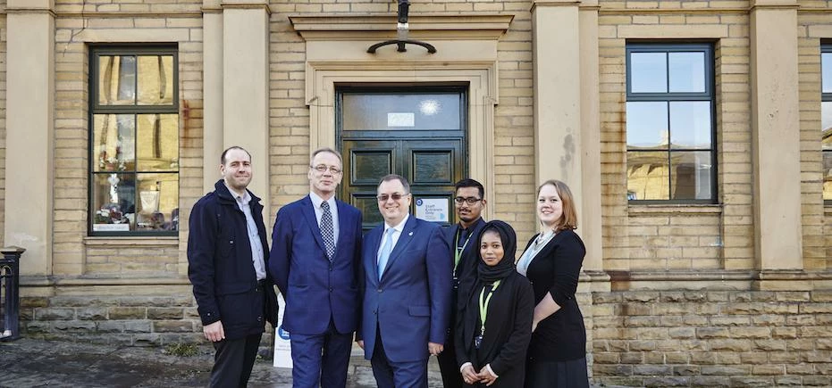 Cllr David Green and Roger Marsh meet with students from Shipley College outside the refurbished Mil