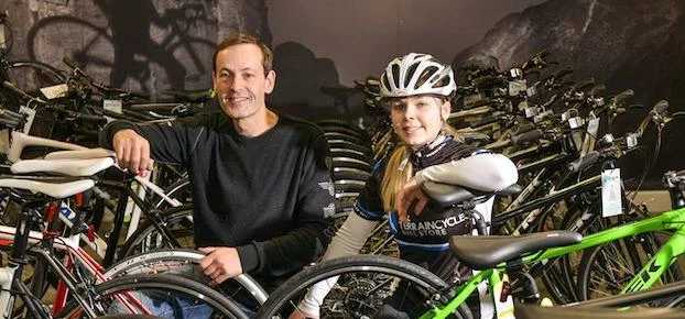 Tony Booth, managing director of All Terrain Cycles, with his daughter, Natasha, purchasing and cust