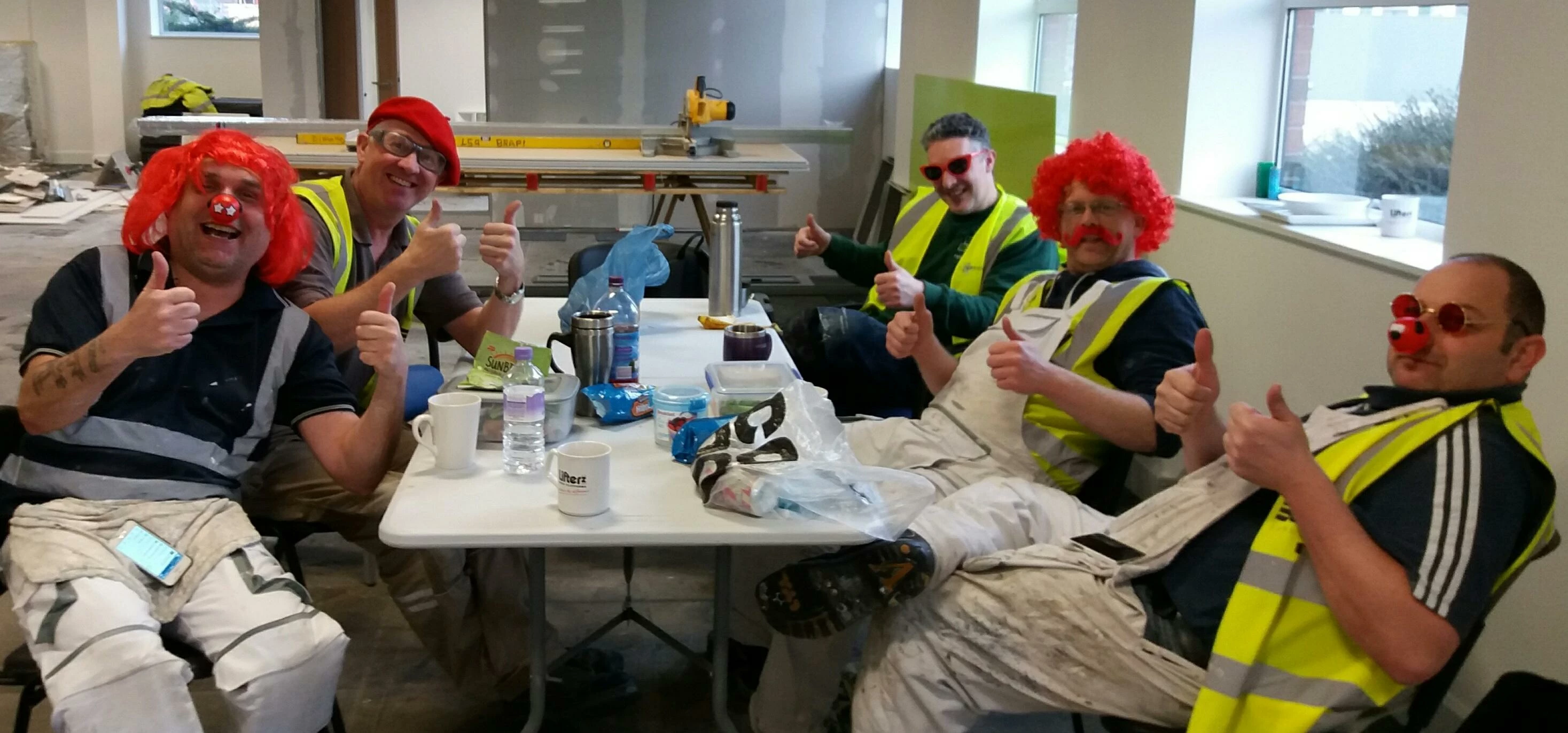 Getting into the spirit of Red Nose Day - Ben Johnson Interiors workers left to right: Nick Kelly, D