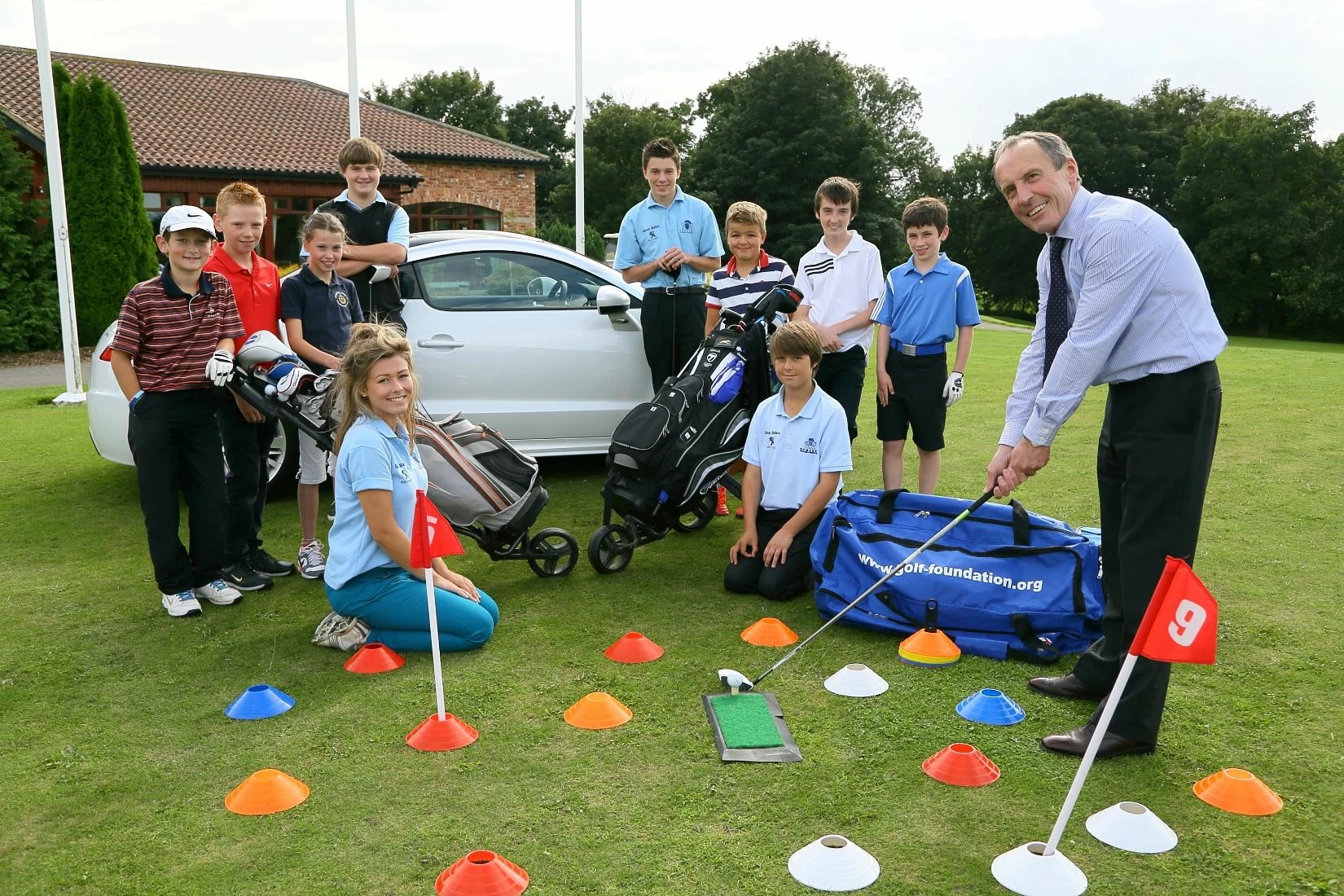 Simon Bailes with some of the Romanby Golf Club Juniors