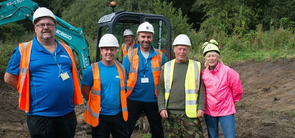Phil Foster, Matthew Holmes and Michael Cunningham, with volunteers Ian Dowson and Fay Quinn