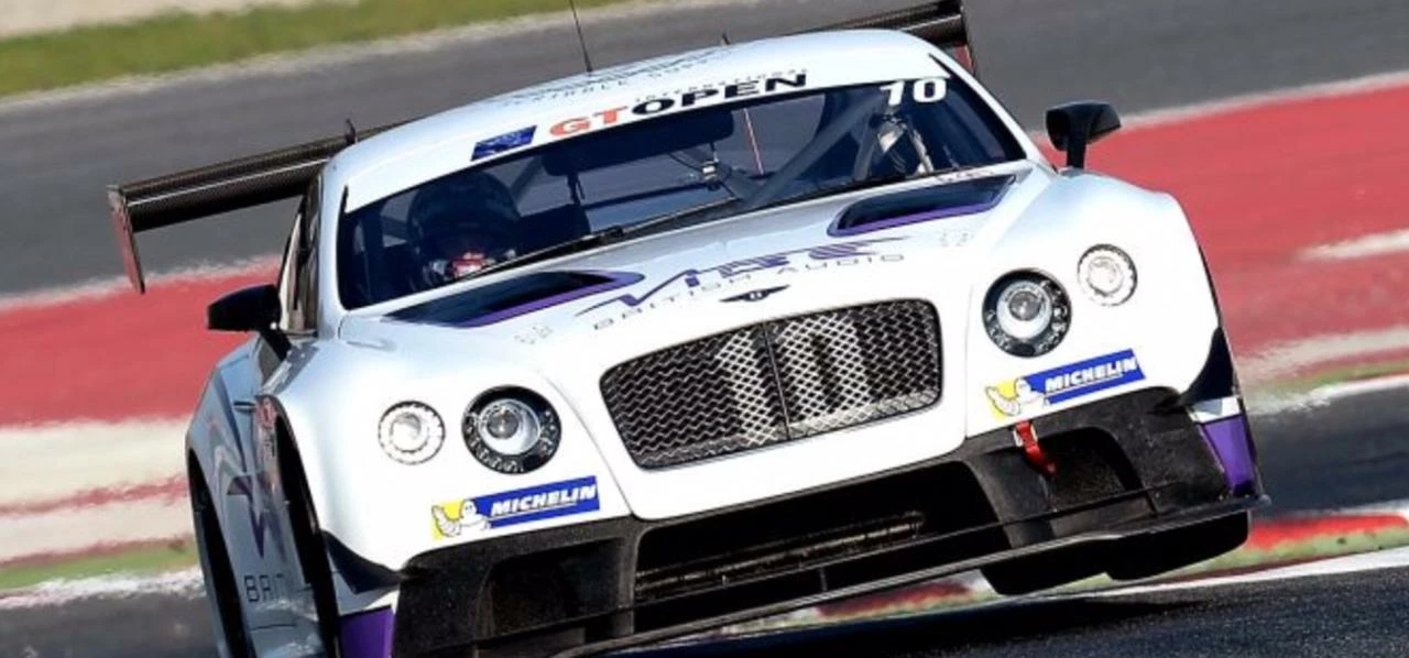 Chris Stockton (inside car) on the track.