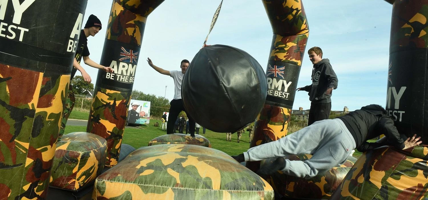 Students try to beat the wrecking ball (Pic Doug Moody Photography)