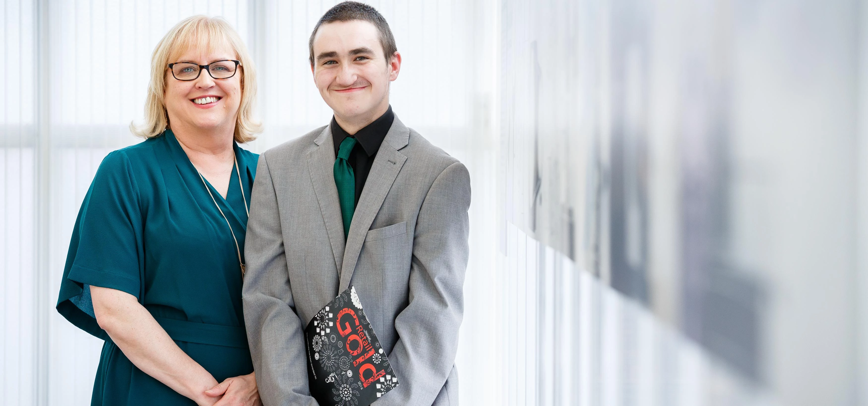 Retail Gold: Excelsior Academy pupil Patrick Larsen with intu's Tracy Allison celebrating his job su