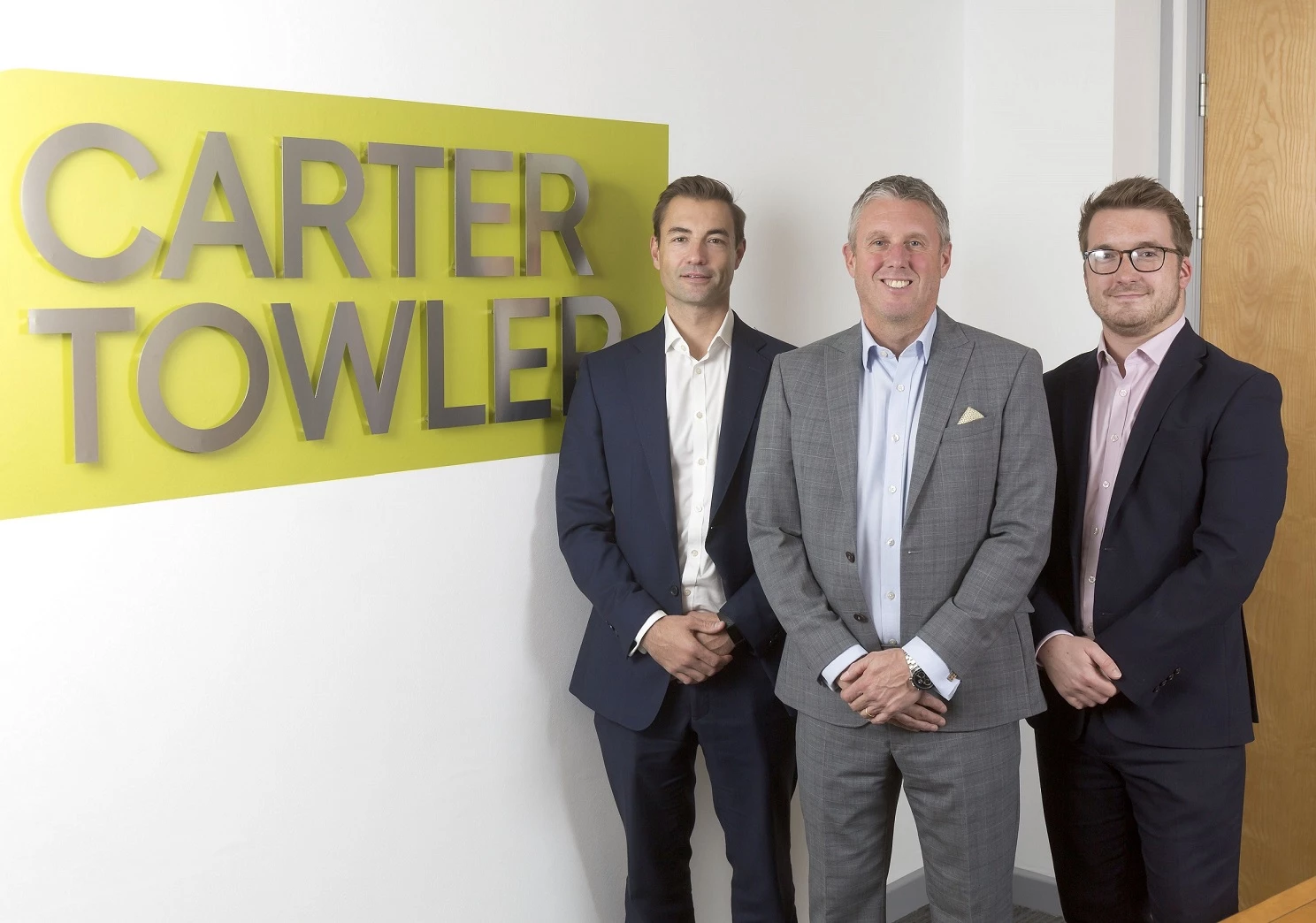 Ian Greenwood of Carter Towler with Jacques Esterhuizen and Brett Harrison 