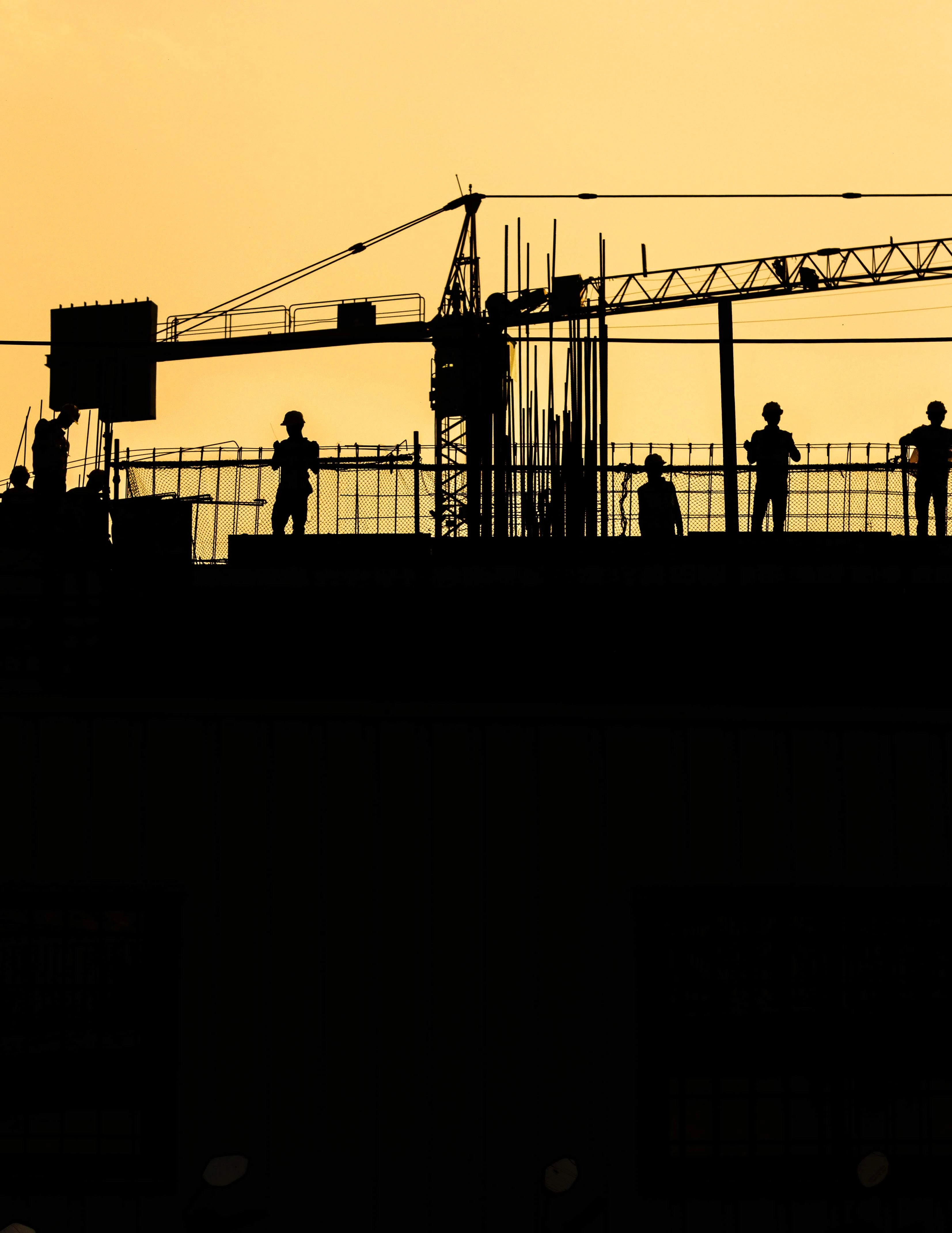 Construction site with workers.