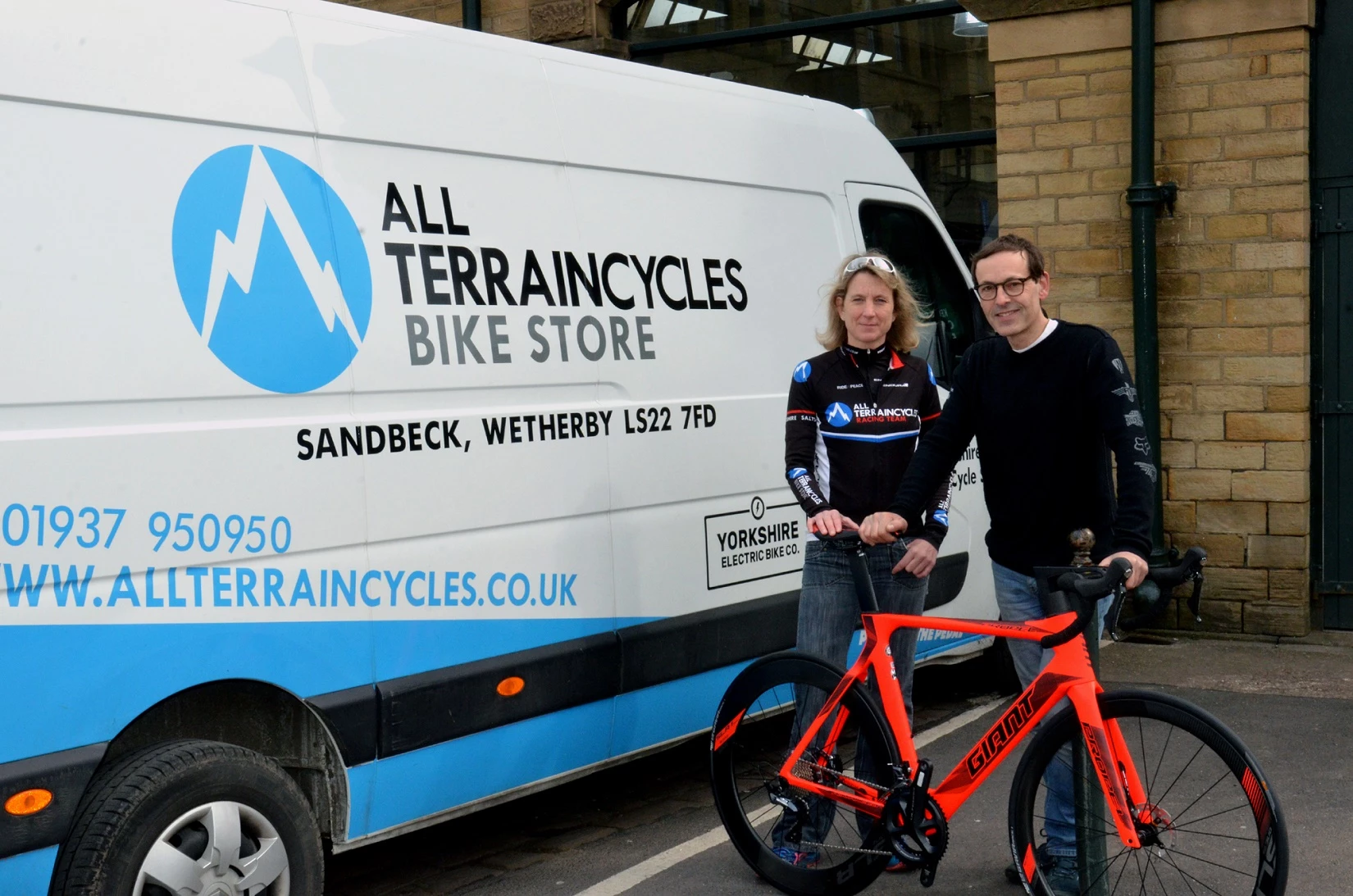 Louise Hanley, Ilkley Tri event organiser and a member of the All Terrain race team, with Tony Booth, managing director of All Terrain Cycles