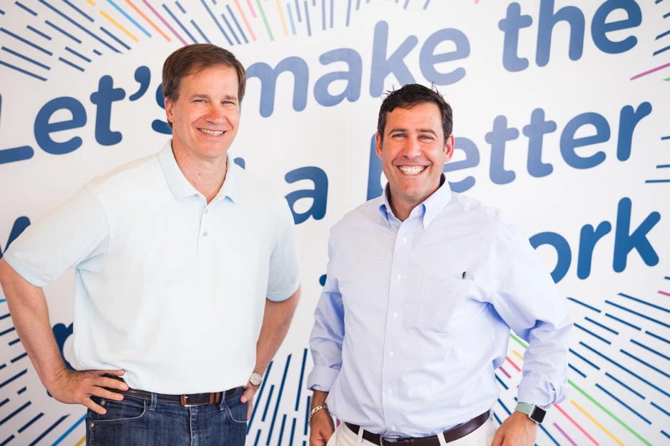 Doug Butler, CEO of Reward Gateway (left), with Brand Integrity's CEO, Gregg Lederman (right)