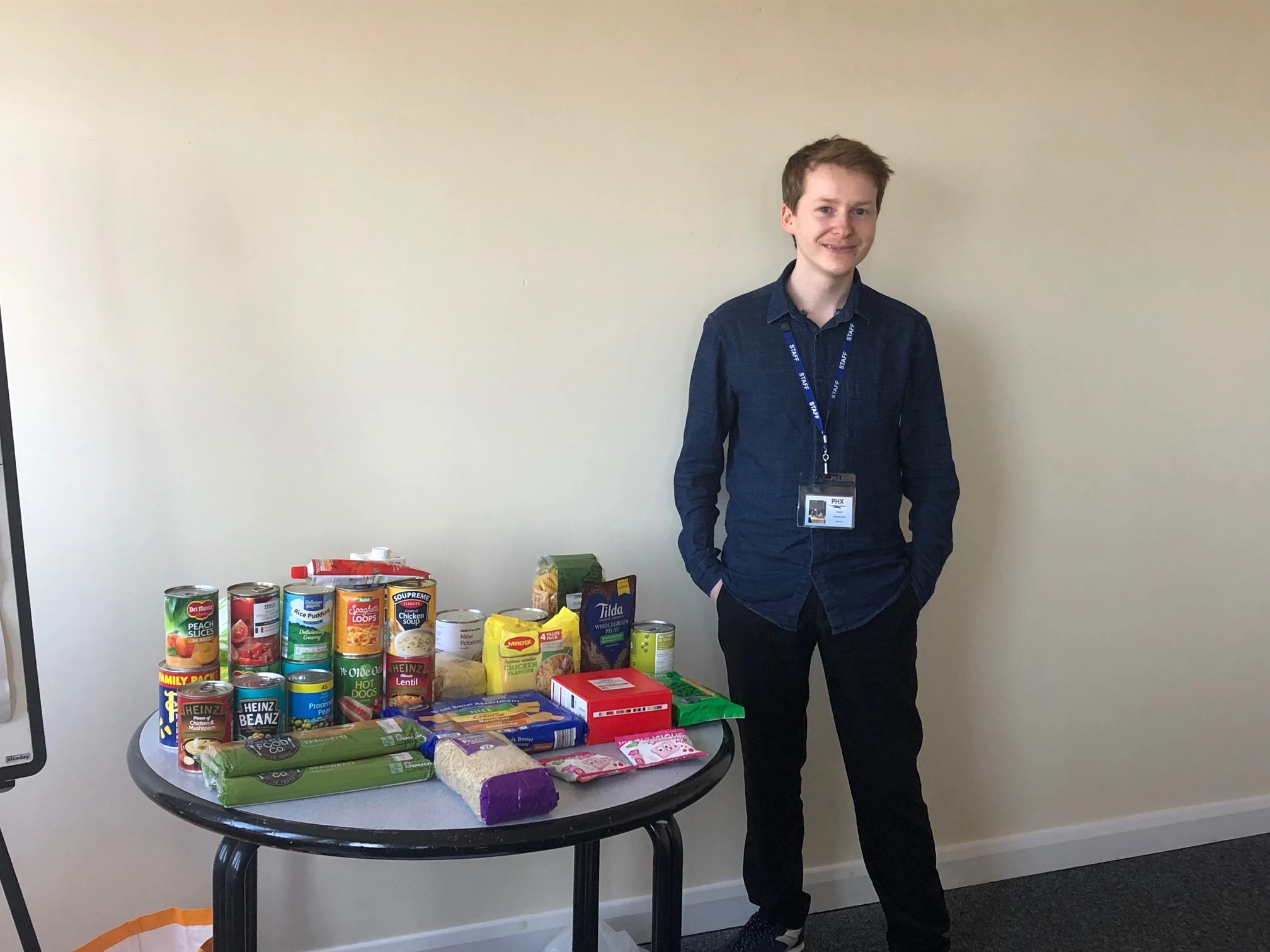 David Hurley with a collection of items for the foodbank