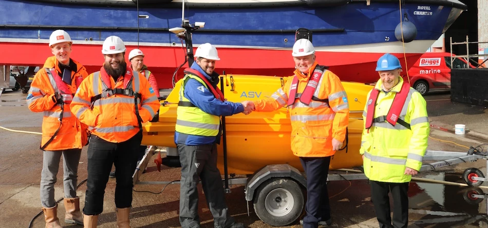 ASV commercial technical sales manager James Cowles (centre left), Peel Ports’ Gary Doyle (centre right) with members of the Peel Ports and ASV teams