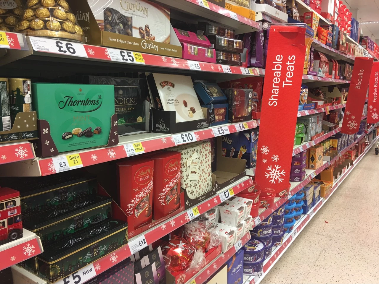 Forecasters are suggesting difficult economic circumstances may mean shoppers stay away from premium food and drink for Christmas.