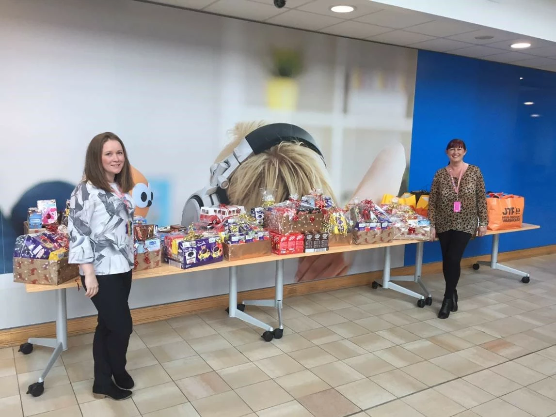 Sara Winter from EDF Energy Renewables, and Nicola Robinson from EDF Energy Doxford with their Easter hamper collection