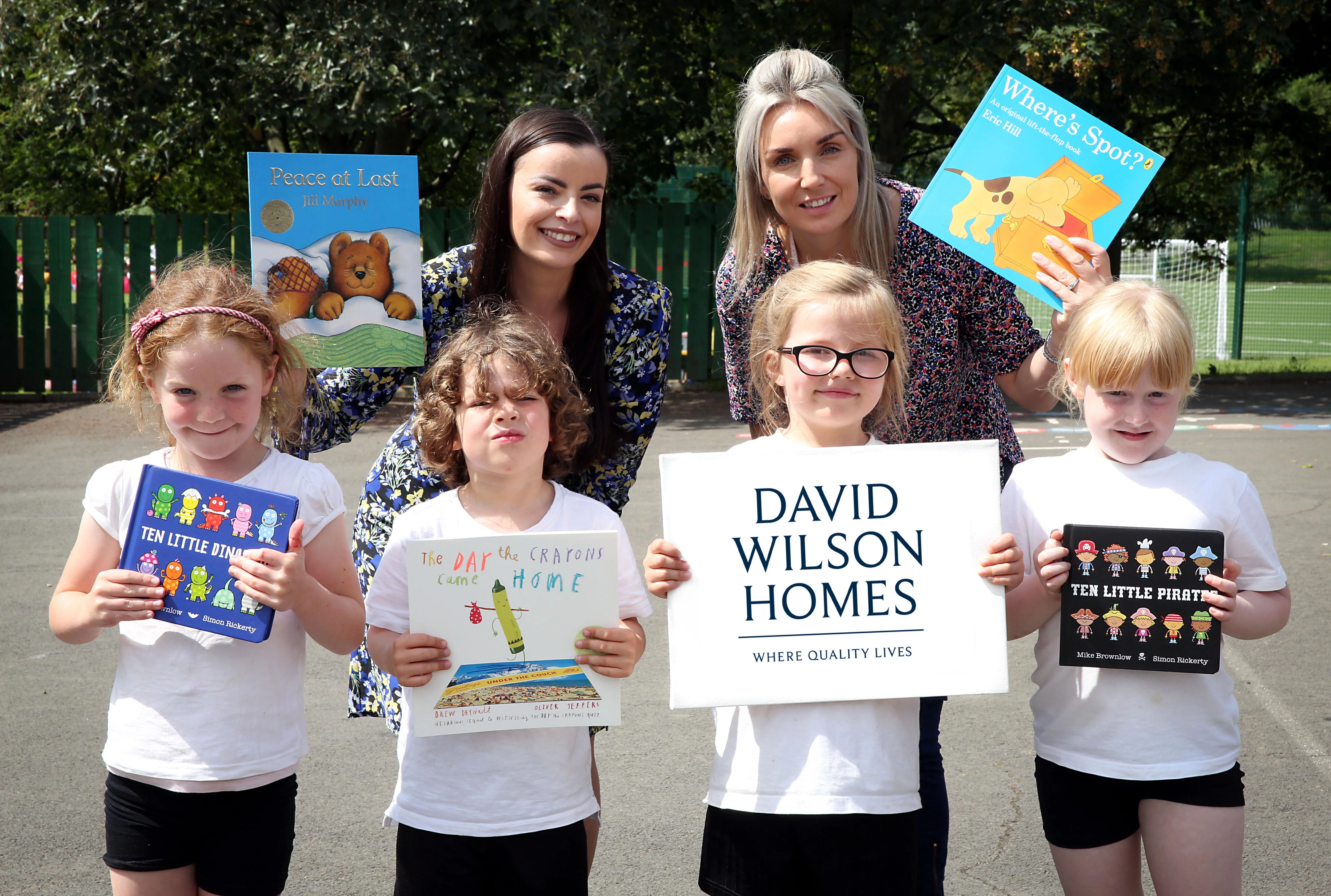 (l-r) Neville's Cross Primary School pupils Katie, Alexander, Imogen and Cassidy with Head Teacher, Hannah Gilmore and Christie Edge, Sales Manager at David Wilson Homes' The Drive at Mount Oswald development
