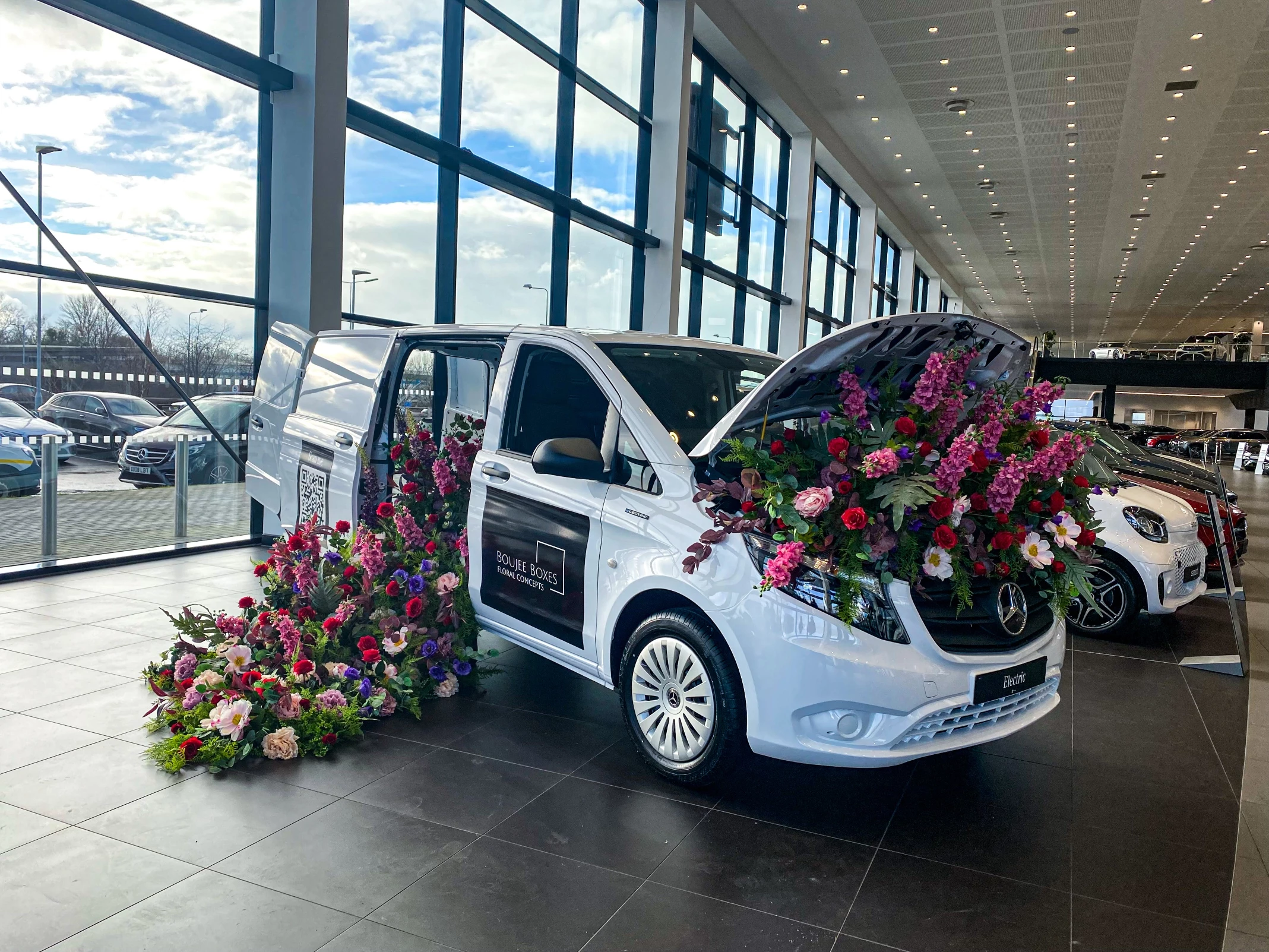 Boujee Boxes floral display at Mercedes-Benz of Stockport