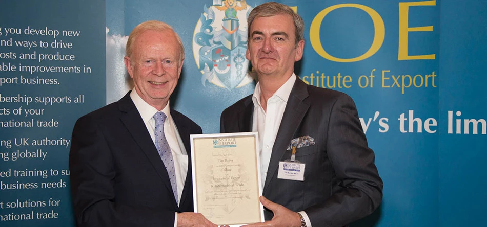 EXPORT HONOUR: Chamber International director, Tim Bailey, (right) receives his award from the vice president of The Institute of Export & International Trade, Lord Reg Empey.