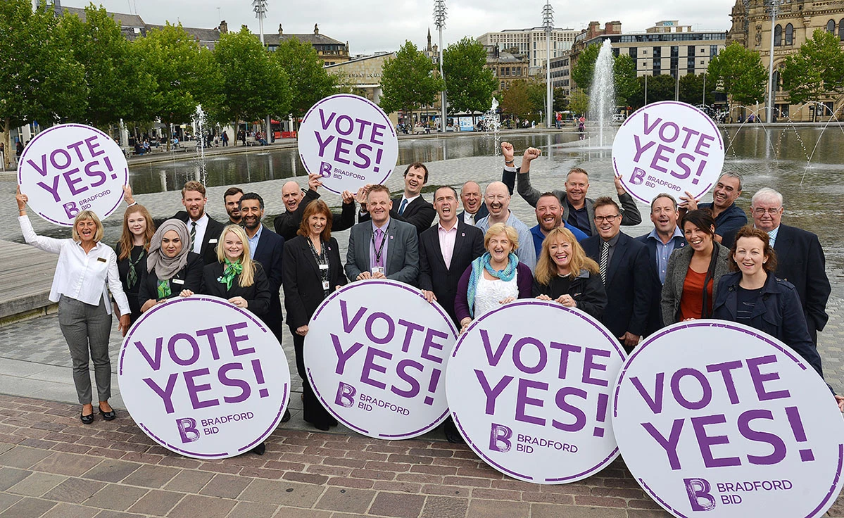 Members of the Bradford BID development board, pictured in City Park, urging businesses to Vote Yes!