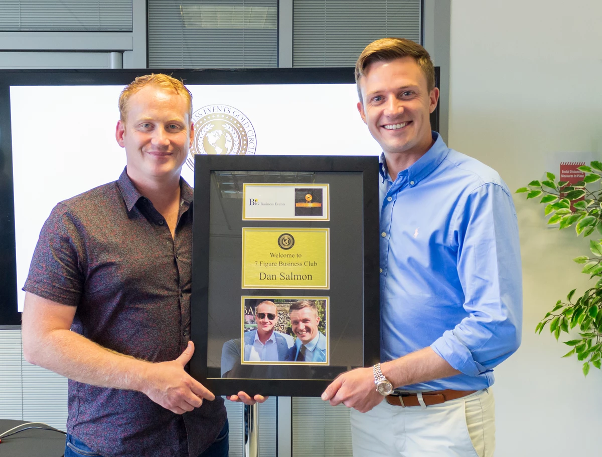 Forbes Coach Adam Stott (left) presents Dan Salmon with his certificate for joining the '7 Figure Business Club' in recognition of his turnover growth in one year.