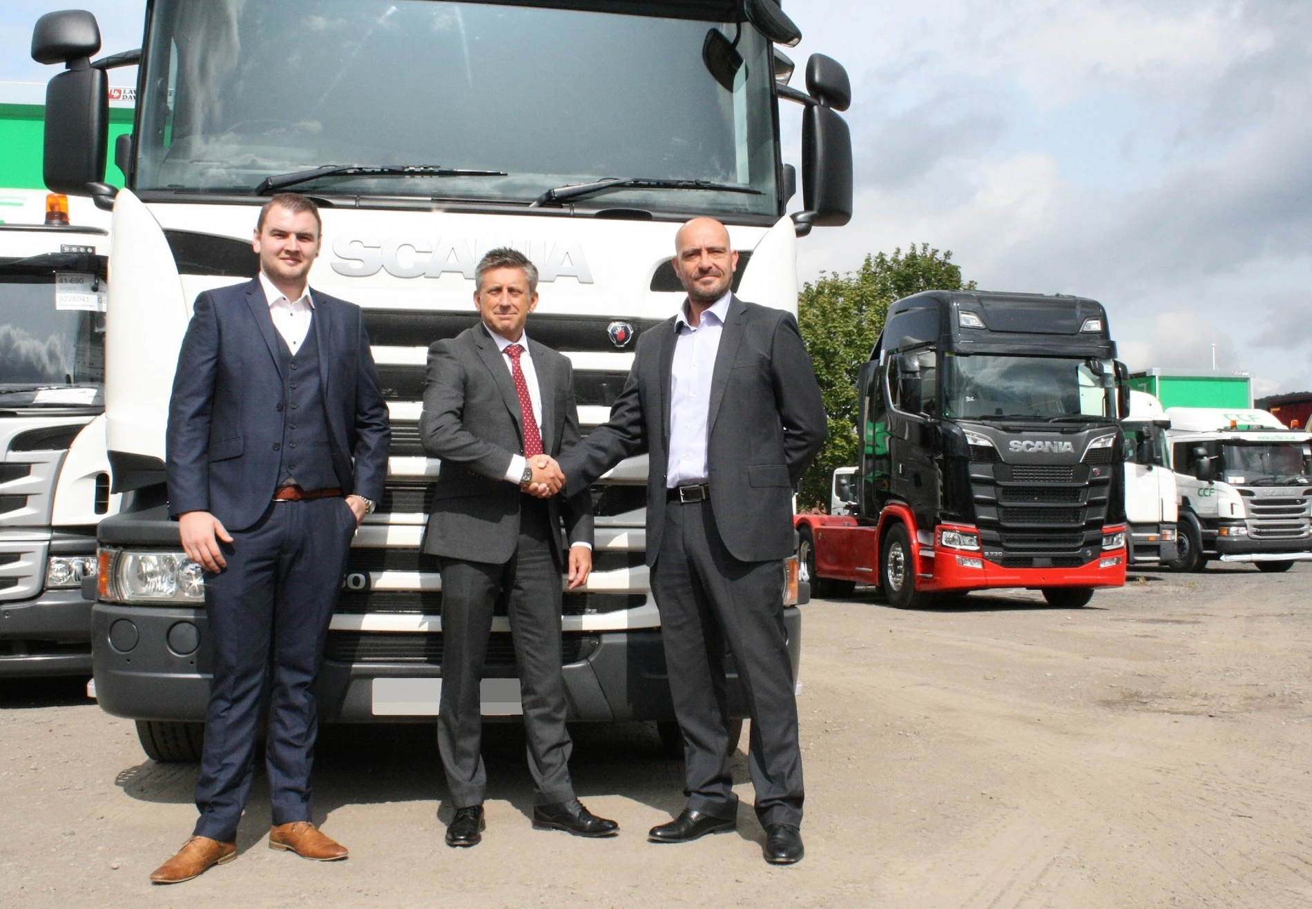 Adam Boyd, manager at DBL Logistics; John Crossland, area sales manager for the East Region at Scania UK; David Clarkson, MD of DBL Logistics.