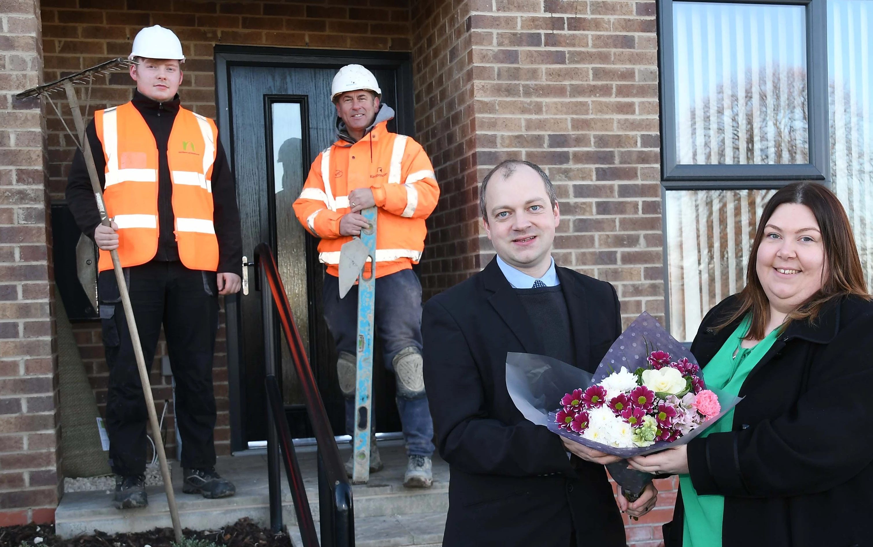 L-R: Northern Groundcare apprentice Cameron Akers, Ashridge Contractors employee Gregory Roy, Cllr Jack Scott and resident Katie Woodhead.