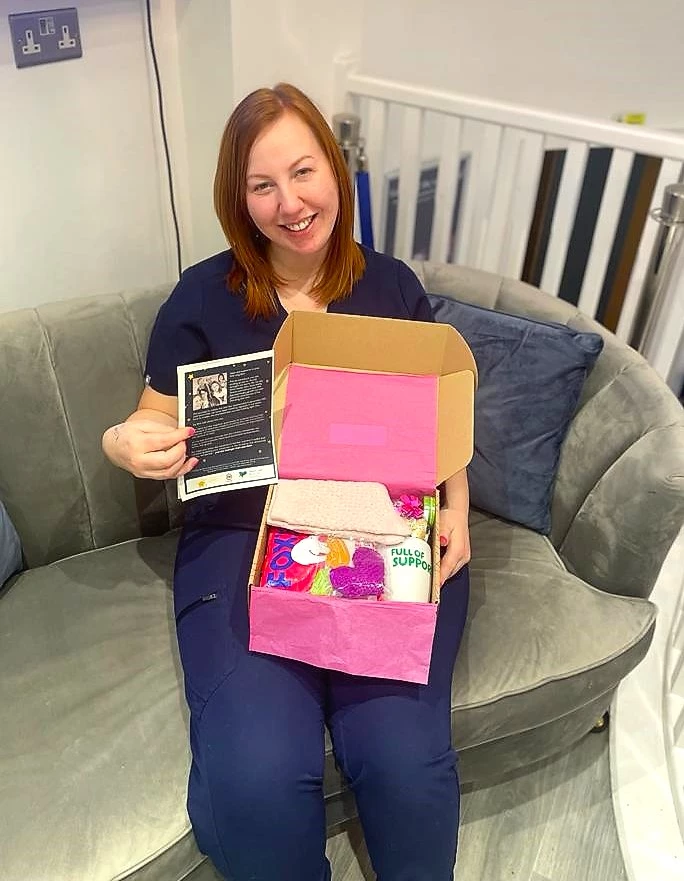 Sara Cheeney with a 'star box' for cancer patients