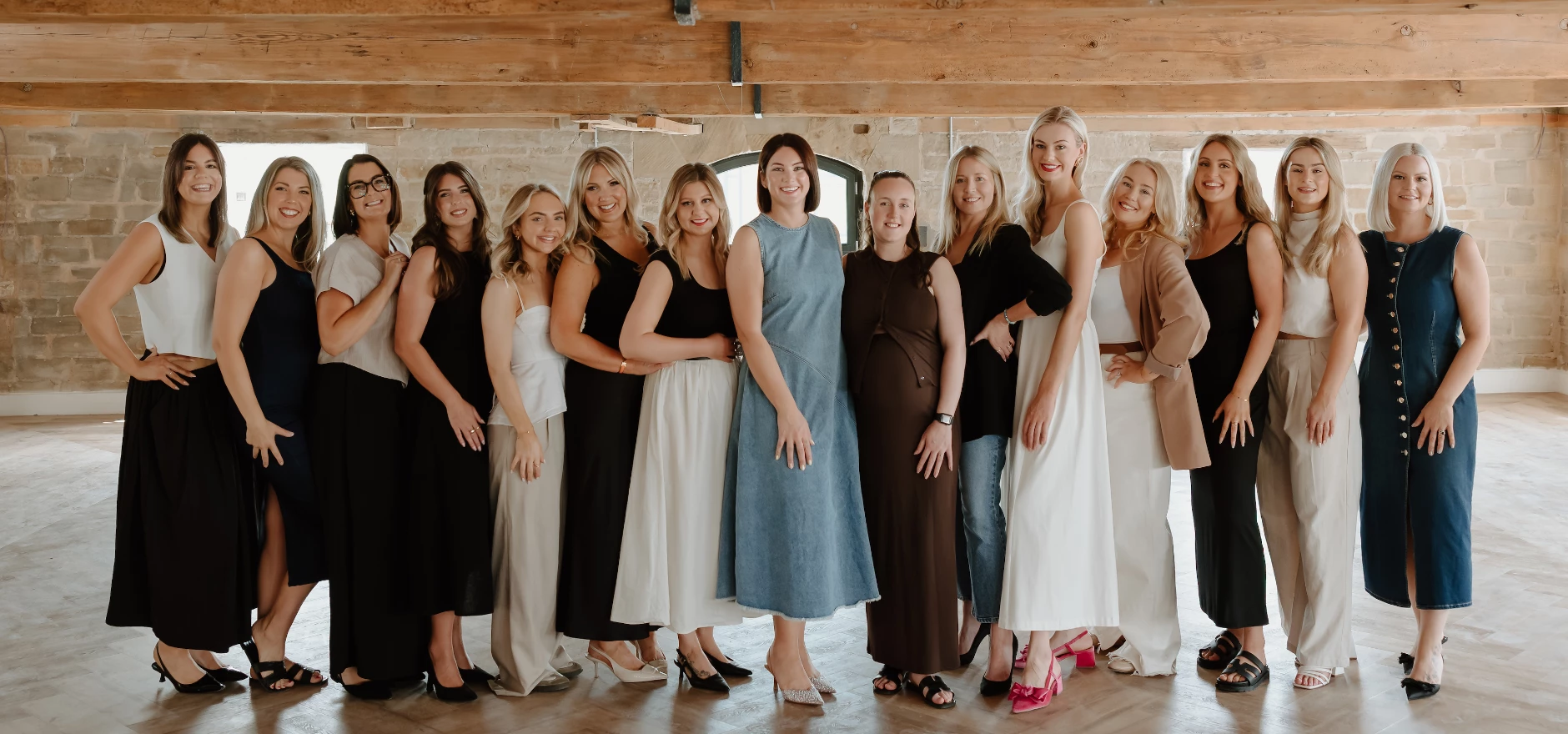 Shannon Martin (centre) with the Dotty Bridal team at the new 16,000 sq ft Wakefield store, due to open on August 11.jpg