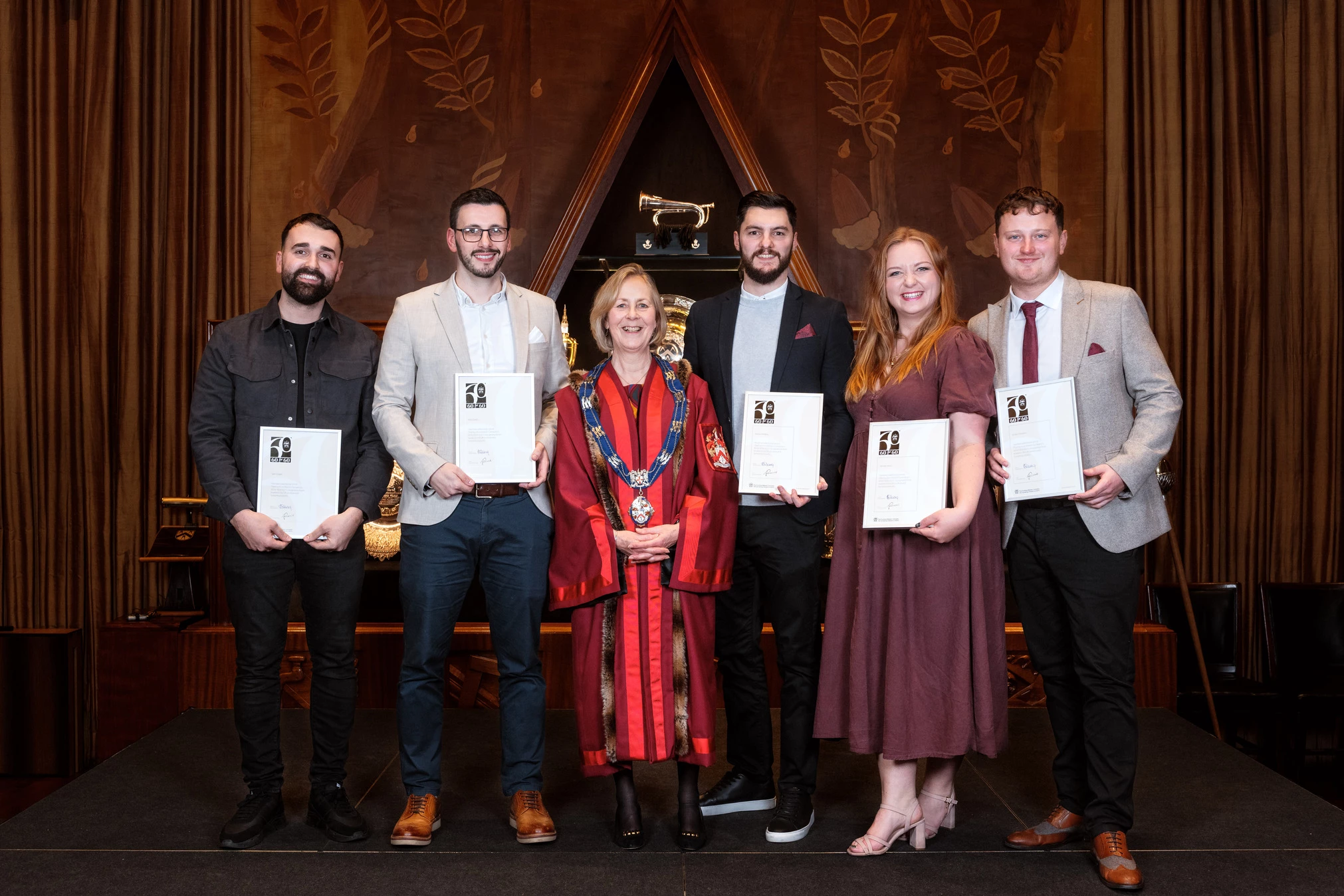 Amanda Waring, Master of the Furniture Makers’ Company, with some of the winners of the Furniture Makers’ Company’s ‘60 for 60’ in the North West: (L to R) Sam Coggin, Mark Denby, Nathan Whiffing, Hannah Shore and Jordan Hargadon