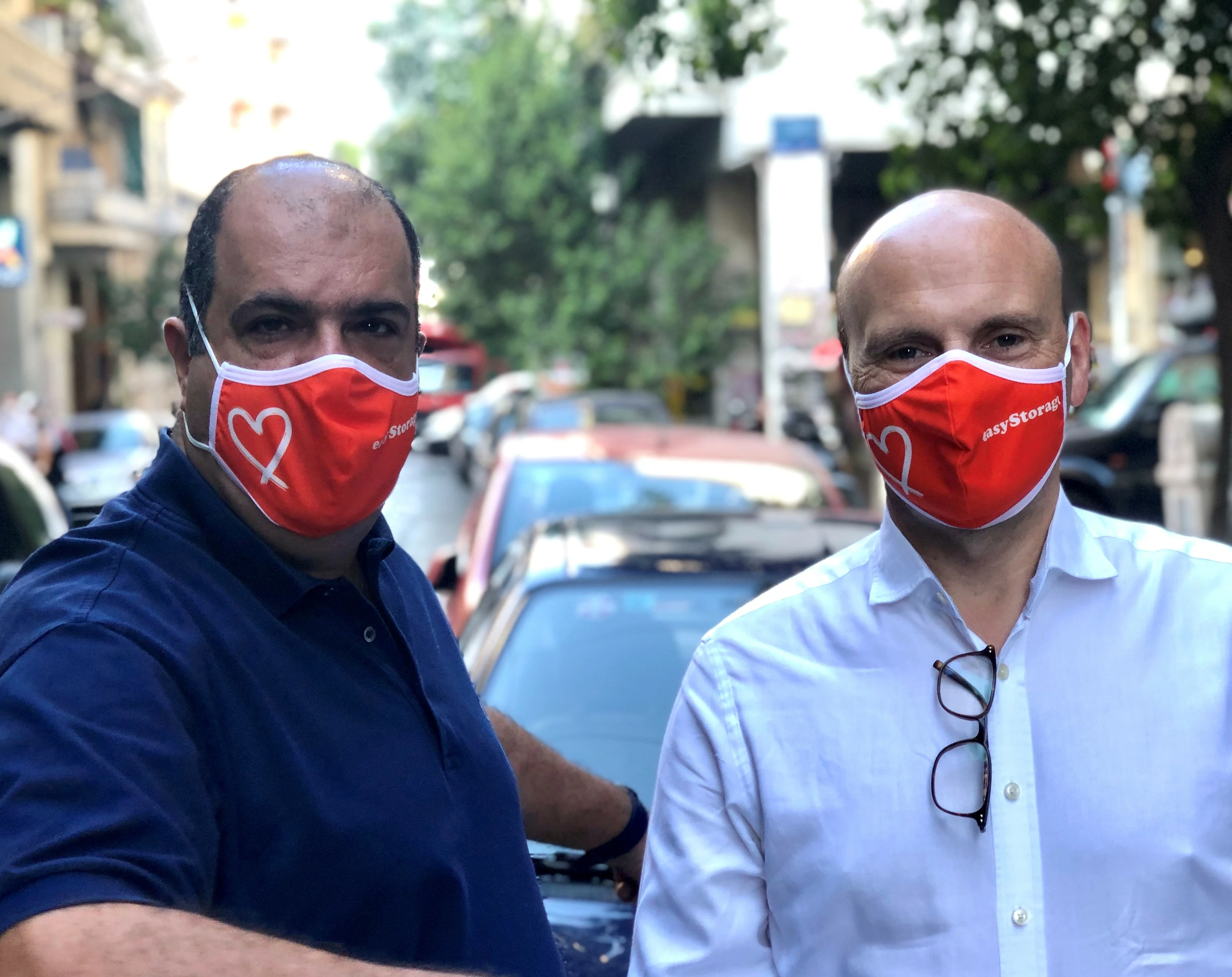 Sir Stelios Haji-Ioannou (L) and Tim Slesinger (R) visit Food from the Heart distribution centre in Athens