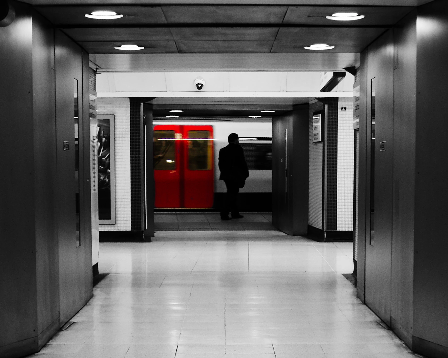 A commuter waiting on the London Underground.