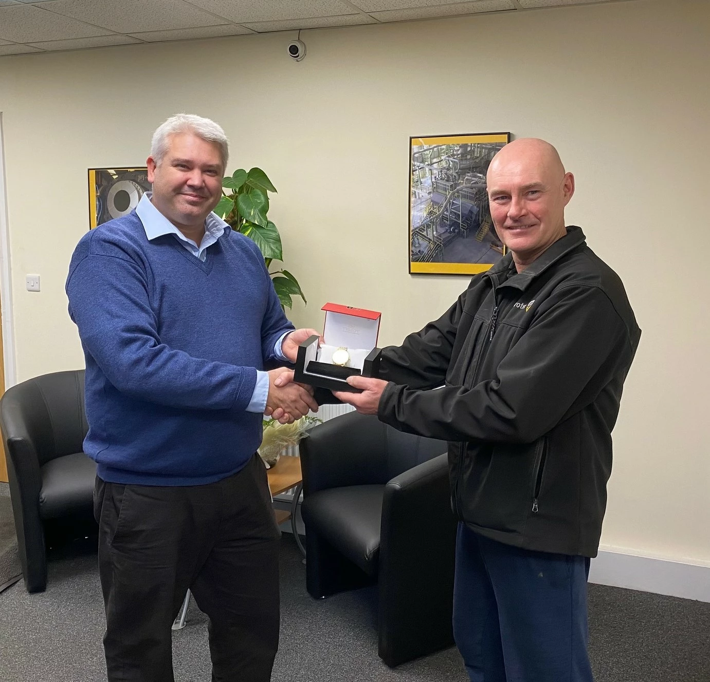 L-r Inprotec Managing Director Chris Oldroyd presents retiring Pete Smith with a gold watch