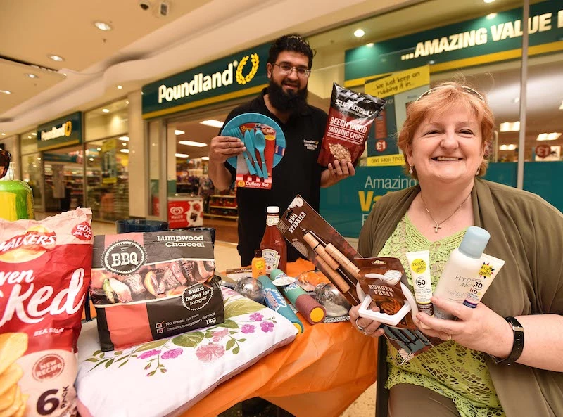 Poundland's Mohammad Afzal and Kirkgate Shopping centre manager Catherine Riley