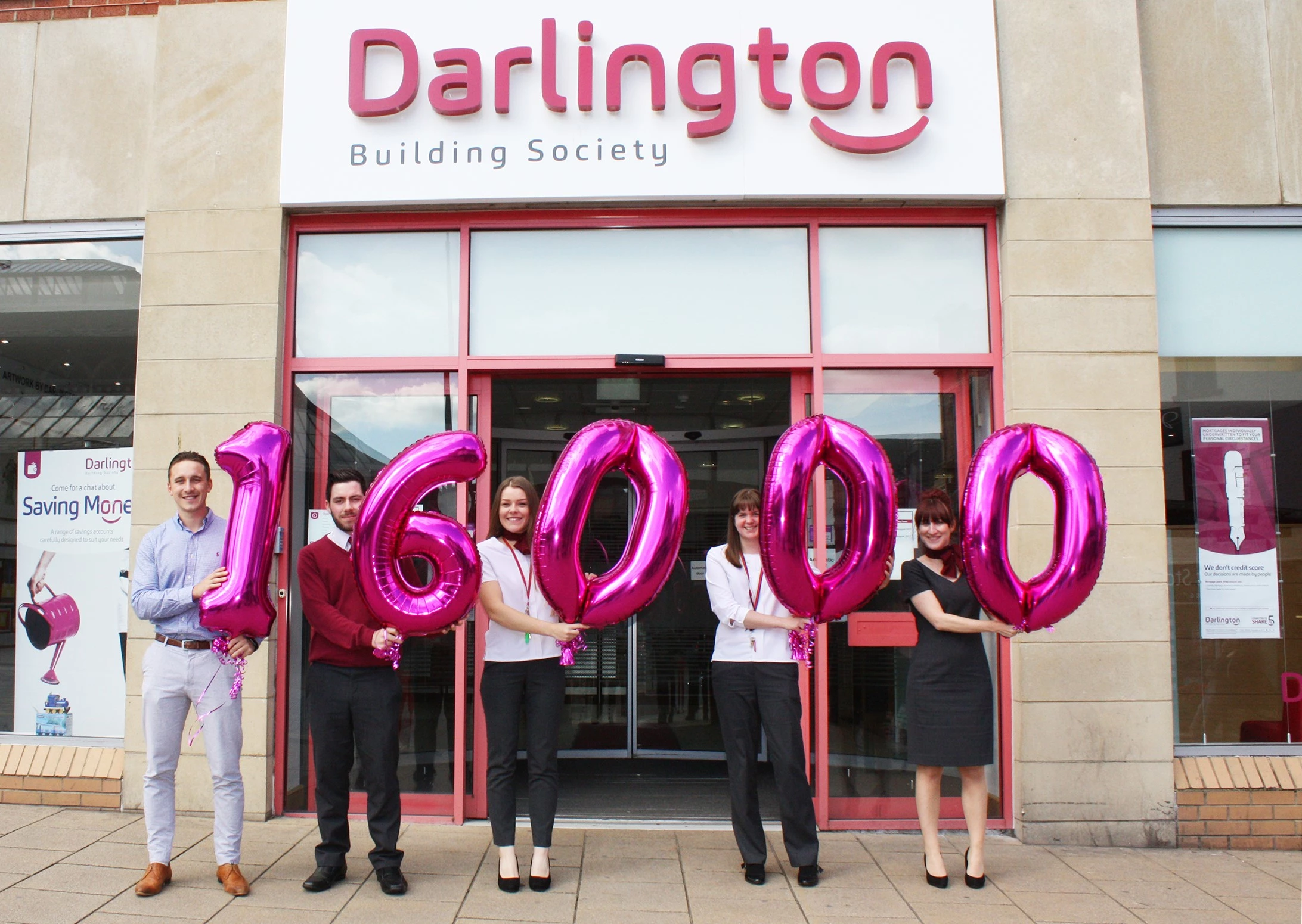 Darlington Building Society Brand & Customer Insight Officer Josh Palin with Tubwell Row branch staff Duncan Spence, Virginia Parry, Michelle Hutchinson and Stephanie Thompson