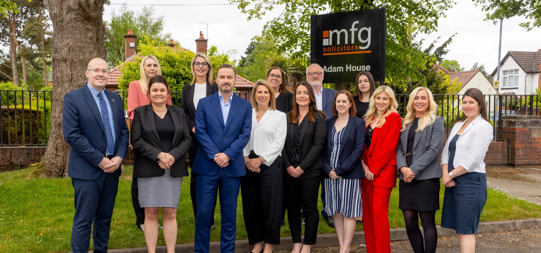 Managing Director, Andrew Davies (front centre) with his the recently promoted  colleagues.jpg