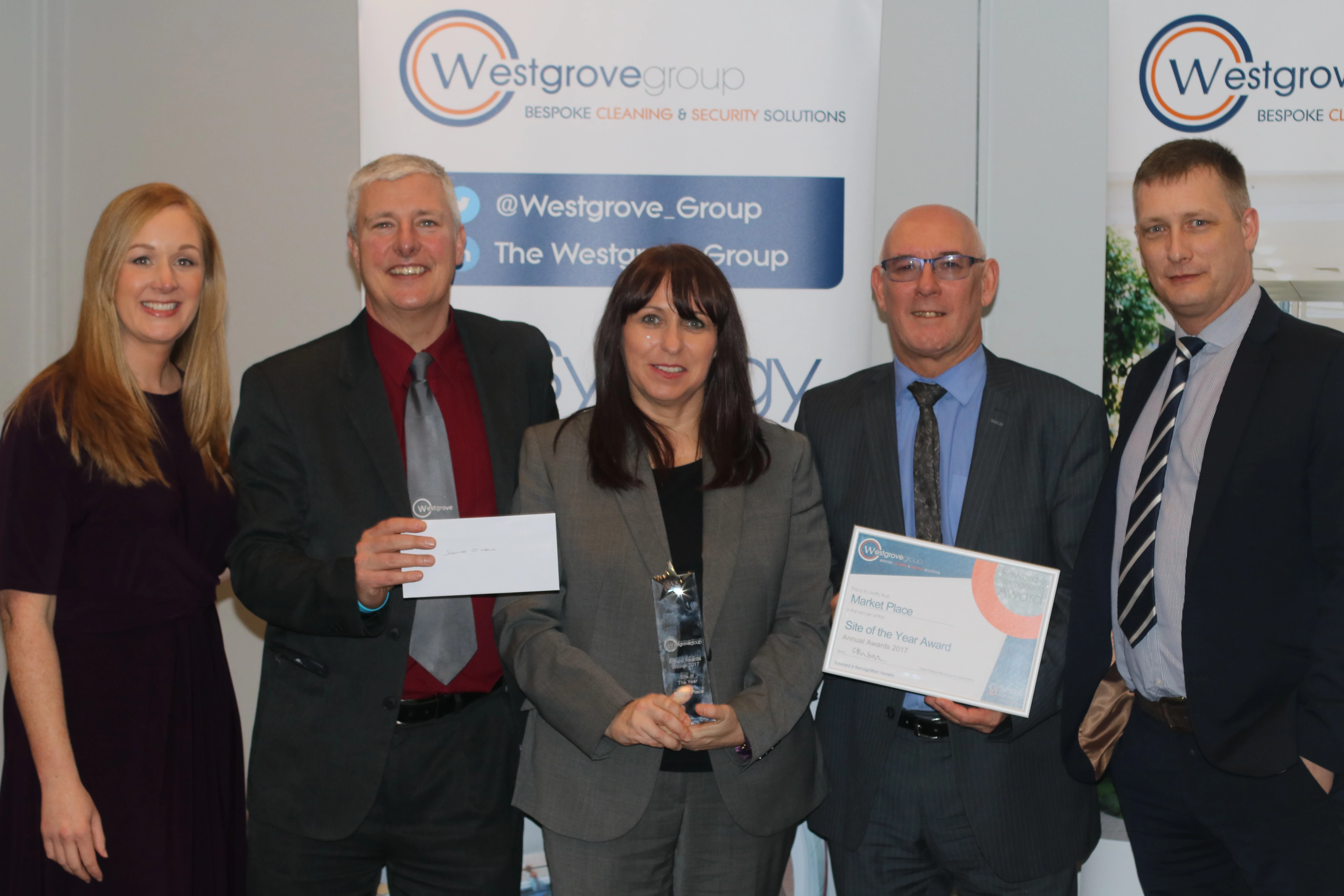 Market Place with their Site of the Year award. from left Helen Jones, Paul Ogden, Joanne O’Neill, Malcolm Berry and Steve Kent.jpg