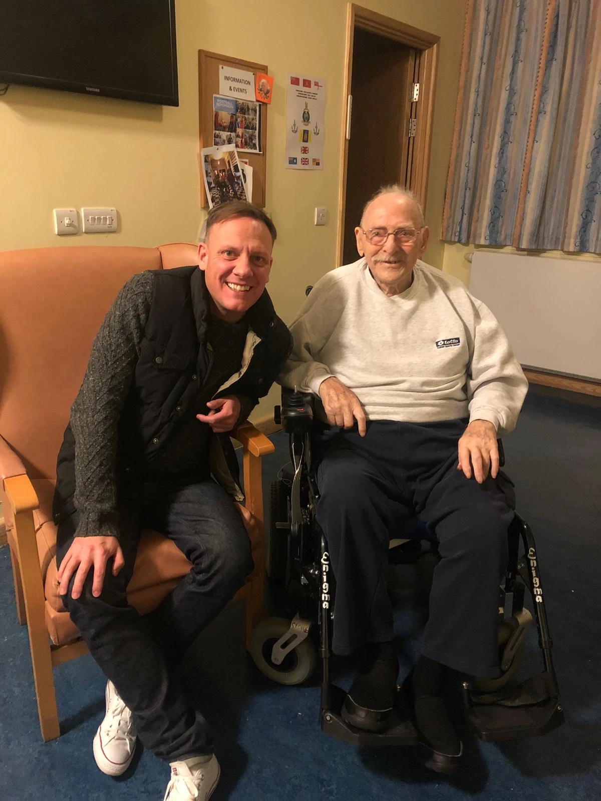 Antony Cotton with Broughton House resident and D-Day vetern George Simms